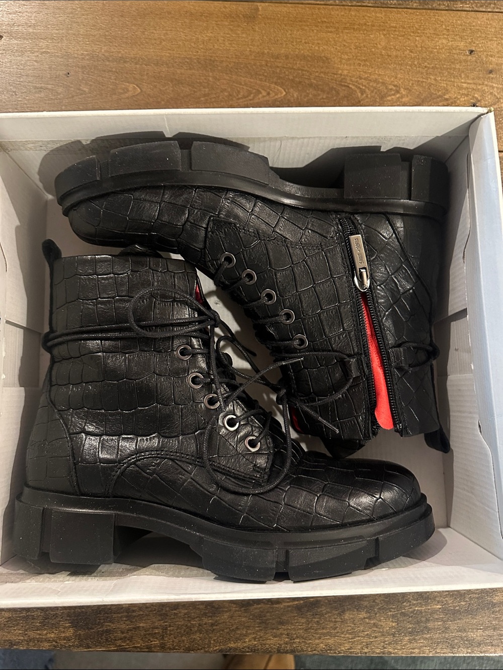 Croc-Embossed Black leather Lug Sole Combat Boots with Red Zip Accent